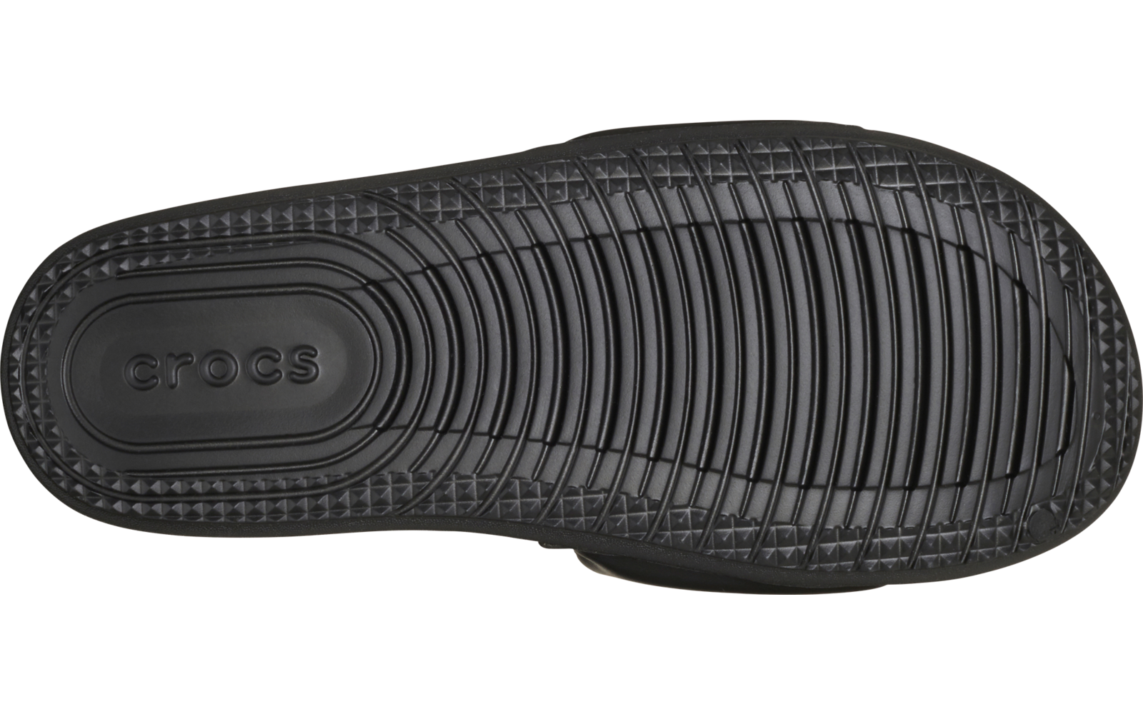 Schwarze Schuhsohle mit Profilrillen und eingeprägtem Schriftzug crocs