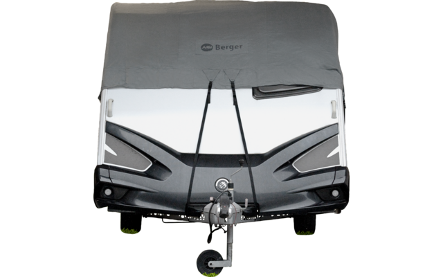 Front of a caravan with a grey cover showing the word “Berger”, two black straps, tow hitch and jockey wheel