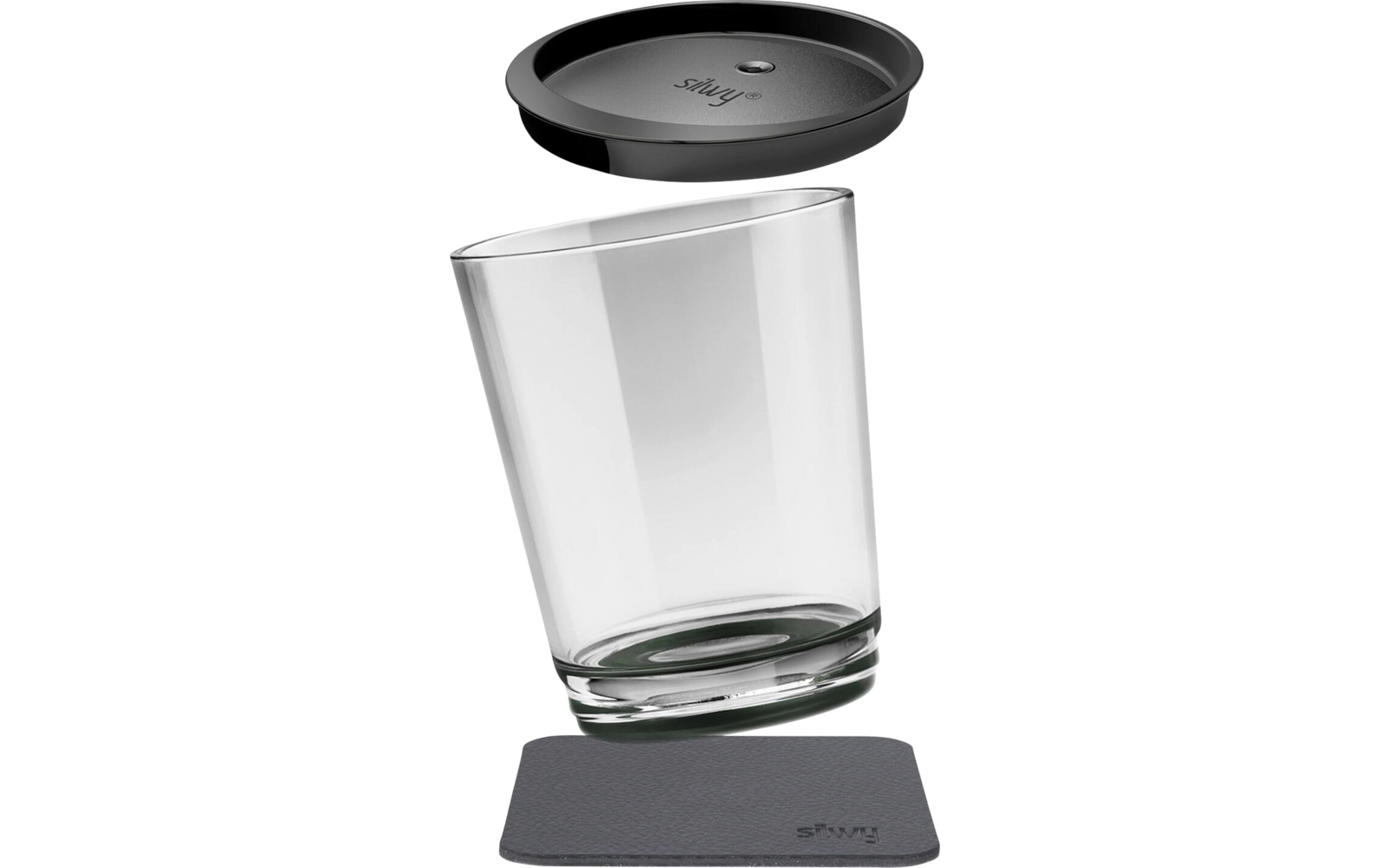 Ein durchsichtiges Glas mit schwarzem Deckel und schwarzer Unterlage