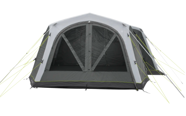 Aufblasbares graues Zelt mit transparenten Fenstern und grünen Heringen auf Rasen