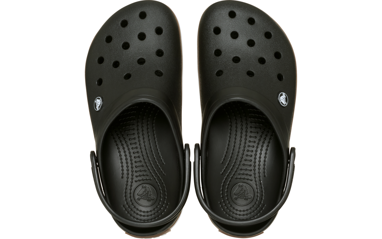 Schwarze Clogs, Draufsicht, Lüftungsöffnungen, Fersenriemen und runde Logo‑Knöpfe