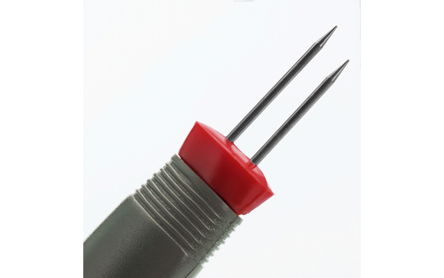 Poignée grise avec un anneau en plastique rouge et deux pointes métalliques