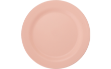 Assiette ronde rose sur fond blanc