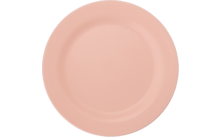 Ronde roze bord op witte achtergrond