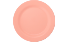 Assiette ronde rose sur fond blanc