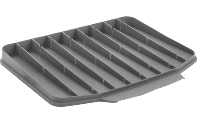 Grijze metalen grillrooster met parallelle staven