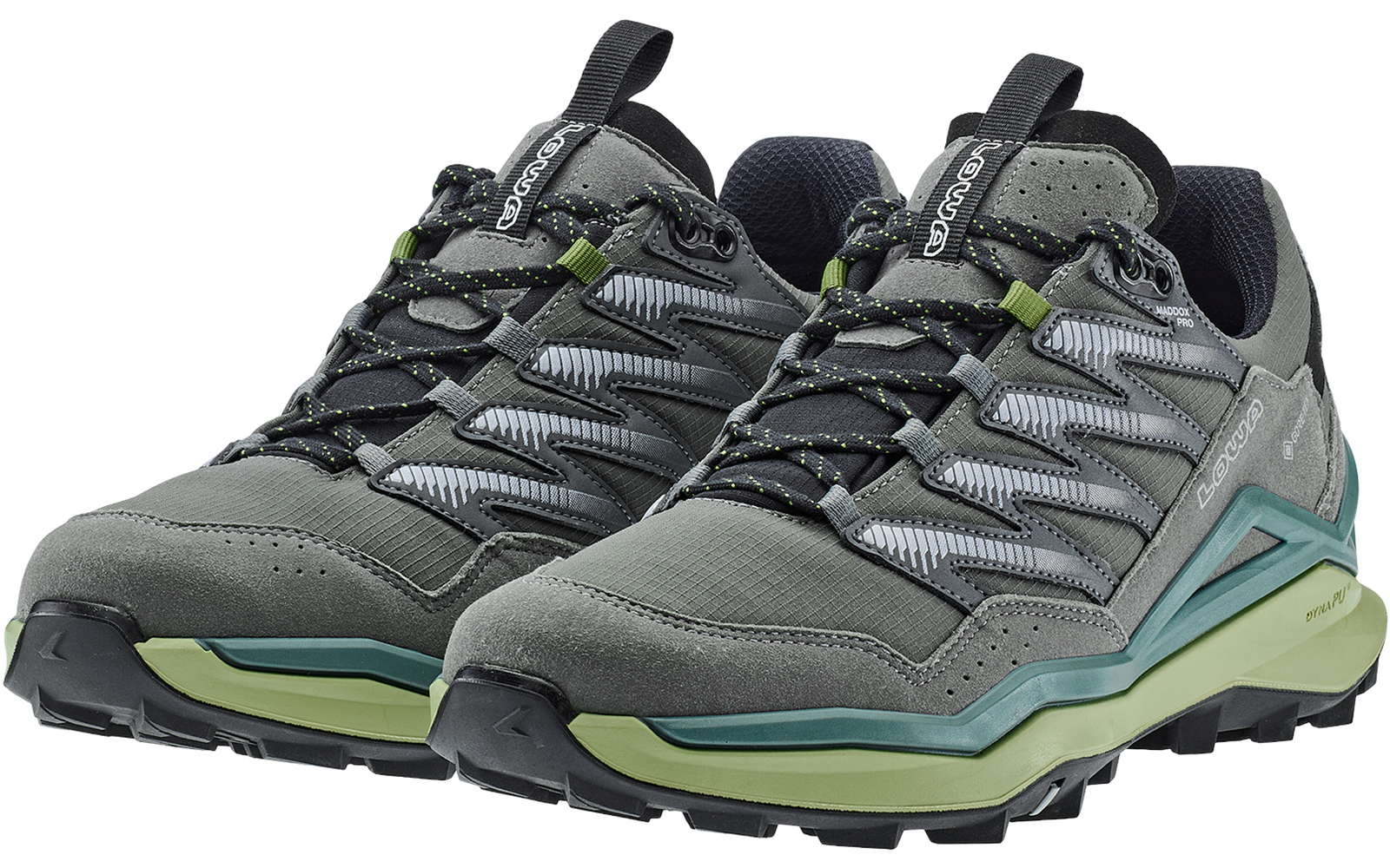 Paar schwarze und grüne Sportschuhe nebeneinander