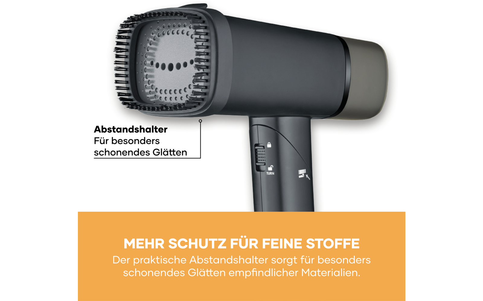 Nahaufnahme eines dunkelgrauen Haarglätters mit rechteckigem Bürstenaufsatz, sichtbare deutsche Beschriftungen 'Abstandshalter Für besonders schonendes Glätten' und orangefarbene Leiste mit weißer Schrift