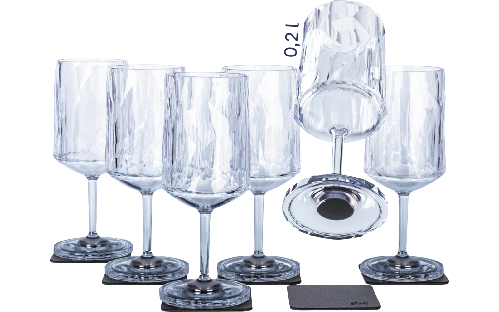 Six transparent glass wine glasses, five standing upright, one lying upside down on the others