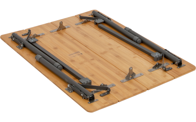 Rectangular wooden tabletop with visible wood grain and folded gray metal legs, hinges and mounting plates on the underside
