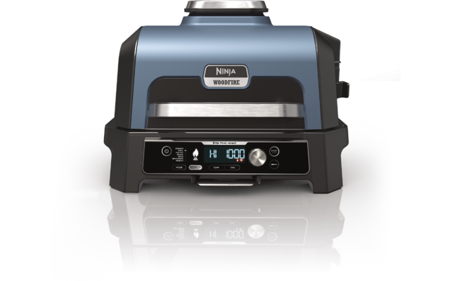 Close-up of a blue kitchen appliance with control panel and attachment