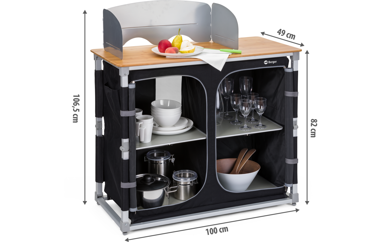 Campingschrank mit zwei Fächern, darauf ein Schneidebrett mit Obst, links Geschirr, rechts Gläser und Schalen, Maße angegeben