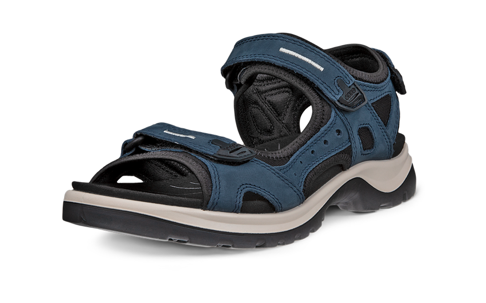 Une sandale bleue à bout ouvert, deux fermetures auto-agrippantes, doublure noire et semelle blanche