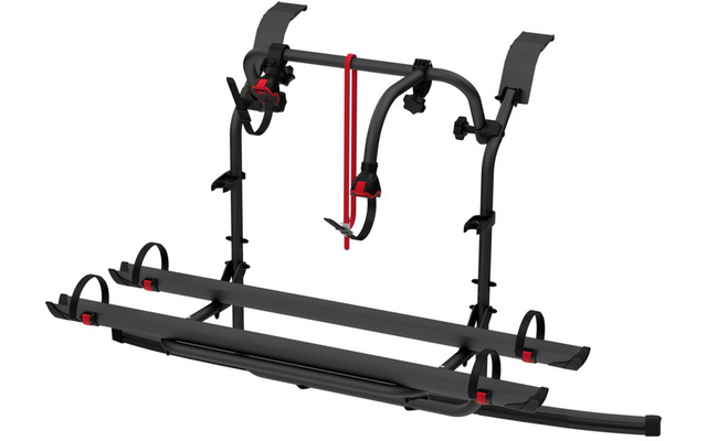 Schwarzes Metallgestell mit zwei horizontalen Schienen, gebogenen vertikalen Halterungen, schwarzen Riemen und Klammern, roten Akzenten, auf weißem Hintergrund