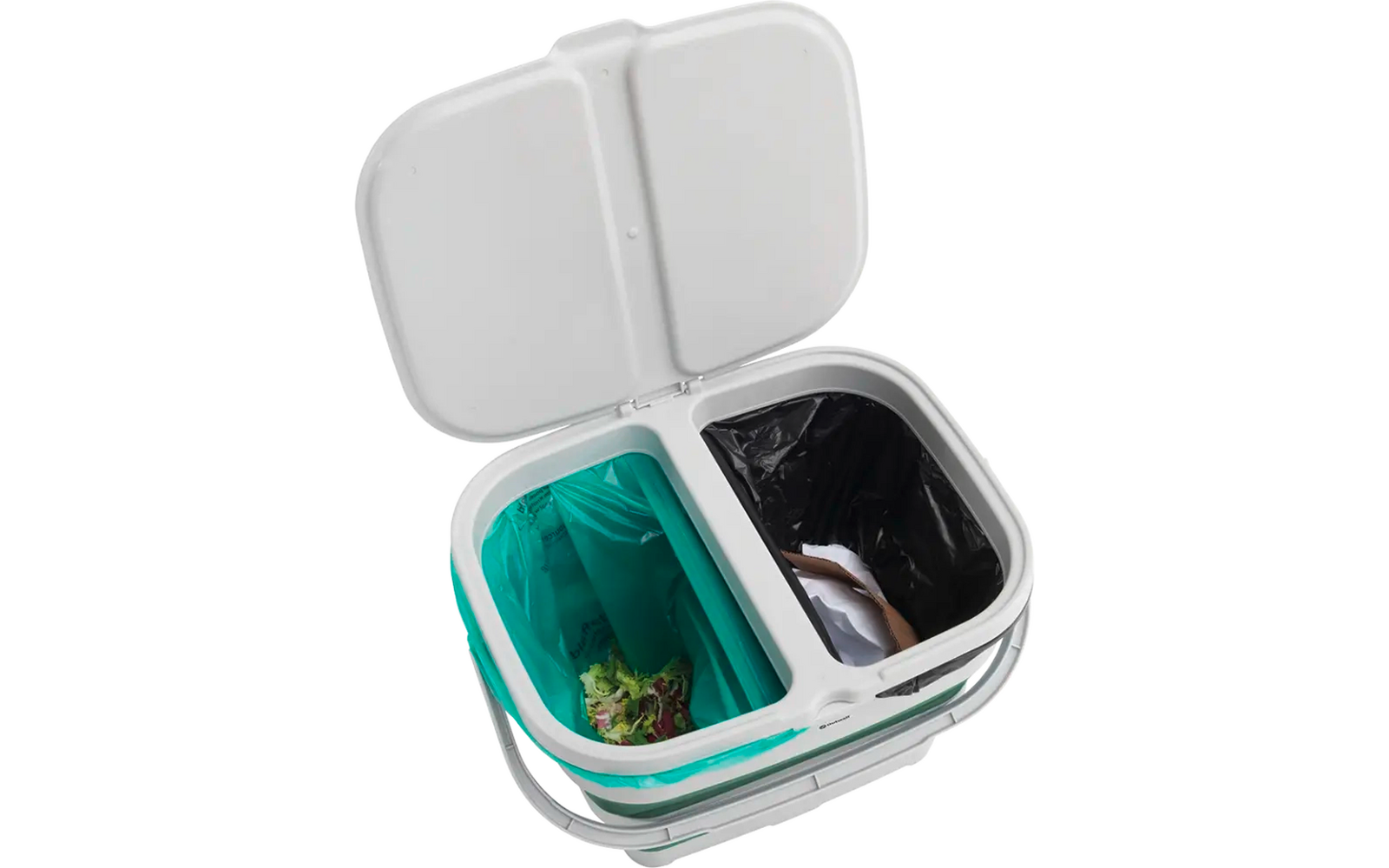 Open kleine witte container met twee vakken, één met blauwe vloeistof en de andere leeg