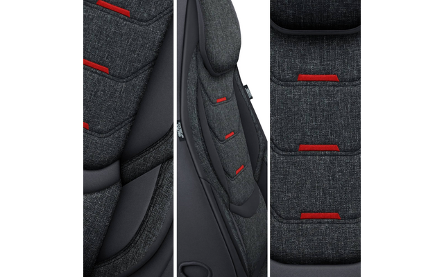 Nahaufnahme eines dunkelgrauen, gepolsterten Sitzbezugs mit roten Schlaufen und schwarzen Kunststoffkanten
