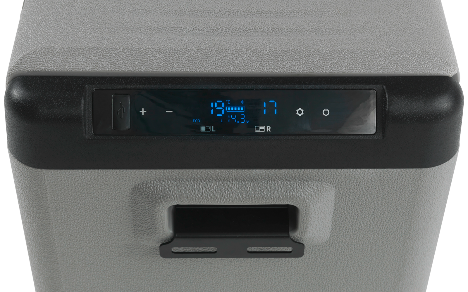 Grau strukturierte Kunststoffoberfläche mit schwarzem rechteckigem Display, blau beleuchtete Ziffern und Symbole, kleine Plus-/Minus-Tasten links, darunter schwarzer Klappgriff und Schlitz