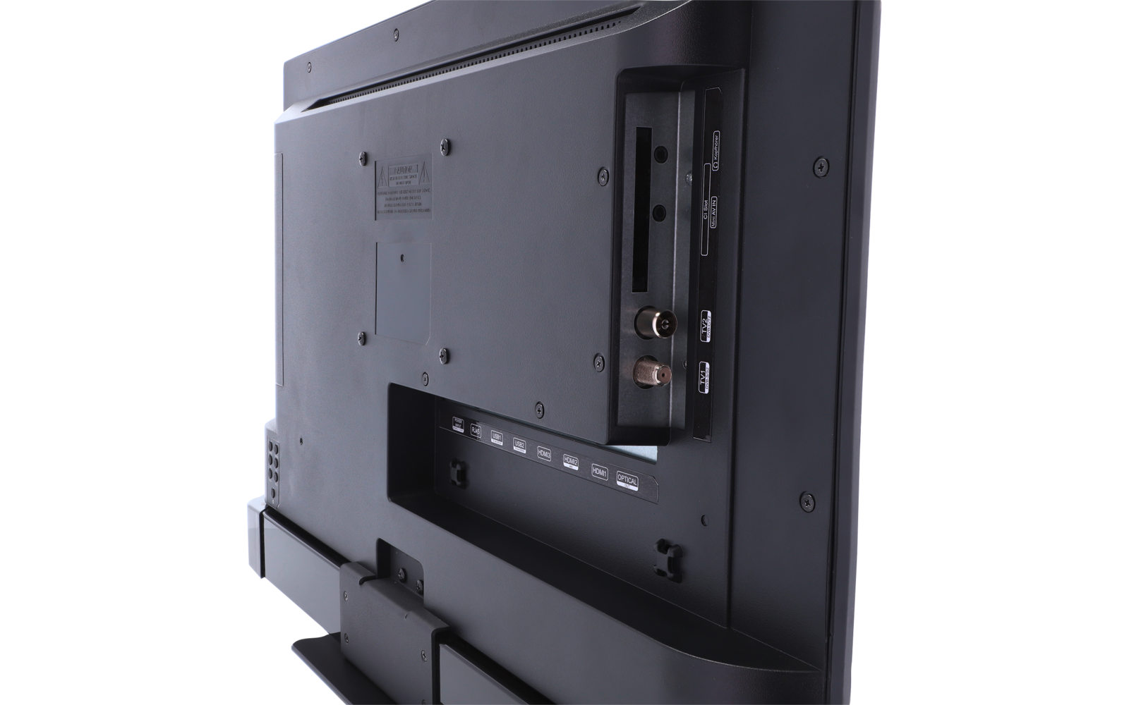 Rückseite eines schwarzen Flachbildschirms mit vertikalem Anschlussfeld, Koaxialbuchse und mehreren rechteckigen Anschlüssen