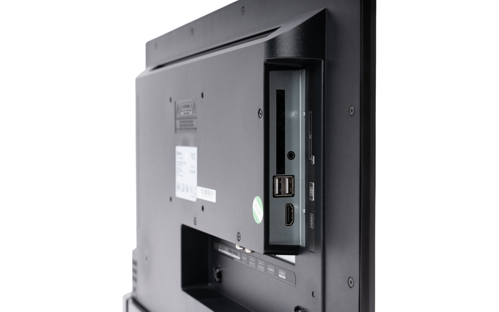 Rückseite eines Bildschirms mit eingelassenem Anschlussfeld, zwei USB‑Anschlüssen, einem HDMI‑Anschluss, einem Kartensteckplatz und Befestigungsbohrungen