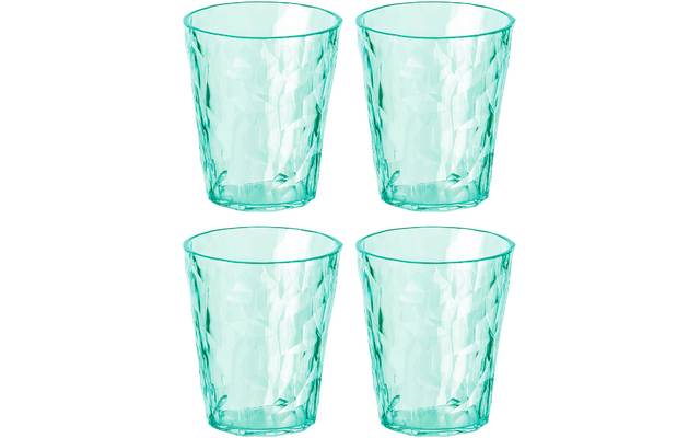 Vier doorzichtige glazen met een groene tint, van voren zichtbaar