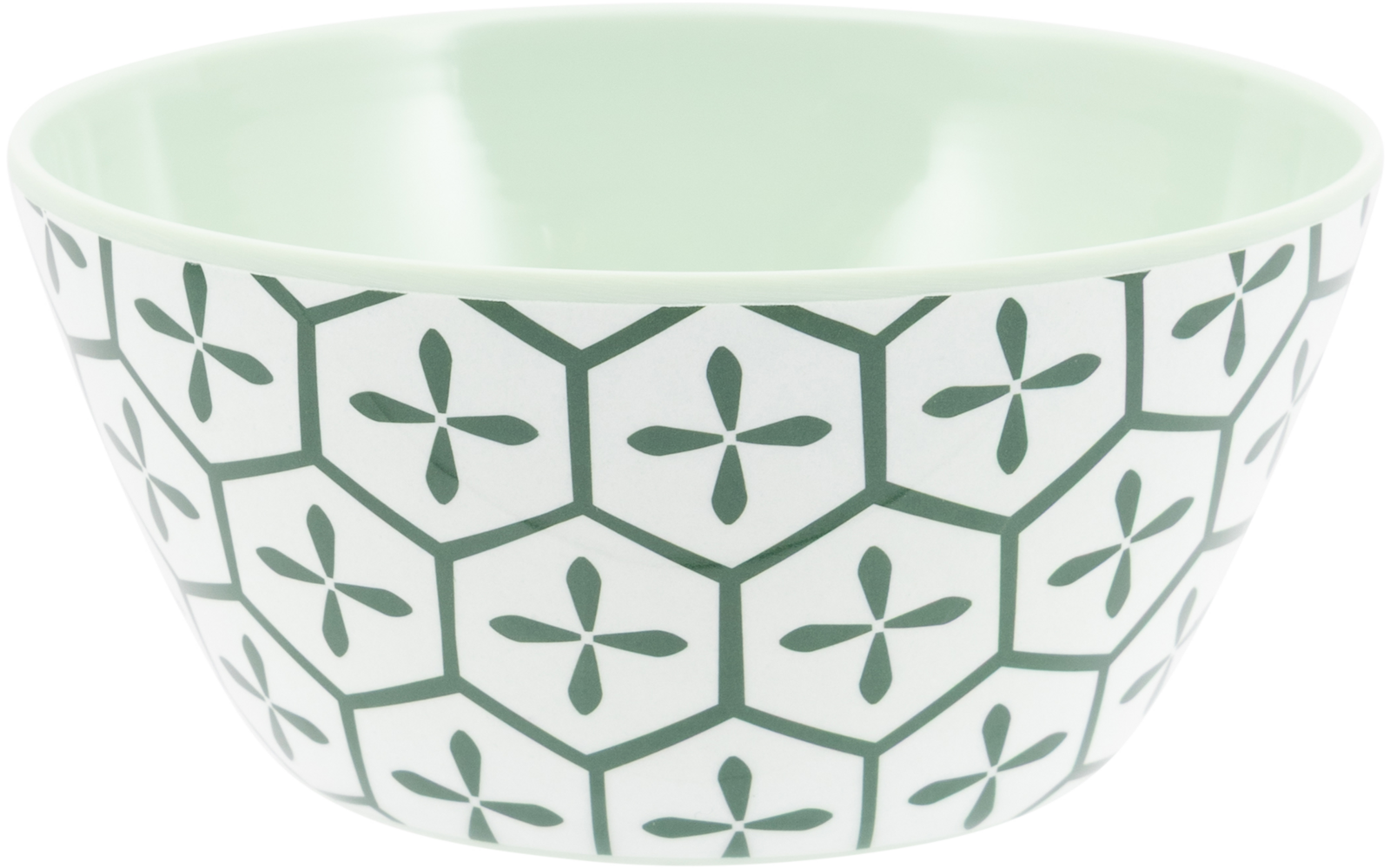 Keramische kom, witte buitenkant met groen zeshoekig patroon en vierbladige motieven, lichtgroene binnenkant, op witte achtergrond