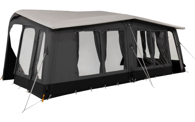 Large black tent with beige roof, multiple windows with light-colored curtains, guy lines and ground anchors