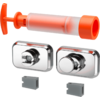 Orange hand pump with transparent barrel, two rectangular chrome plates with round controls, and two small gray plastic blocks