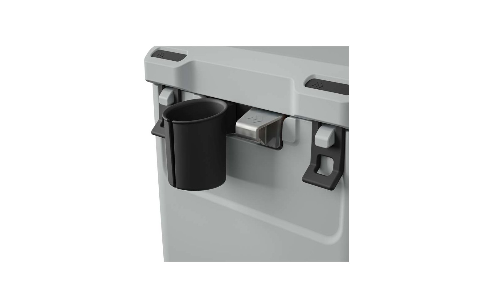 Nahaufnahme eines grauen Geräts mit einem schwarzen Becherhalter und einem Metallhebel