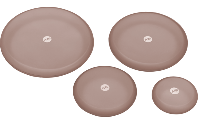 Vier ronde platte roze-beige borden in verschillende maten op een witte achtergrond, elk met een kleine witte cirkel in het midden