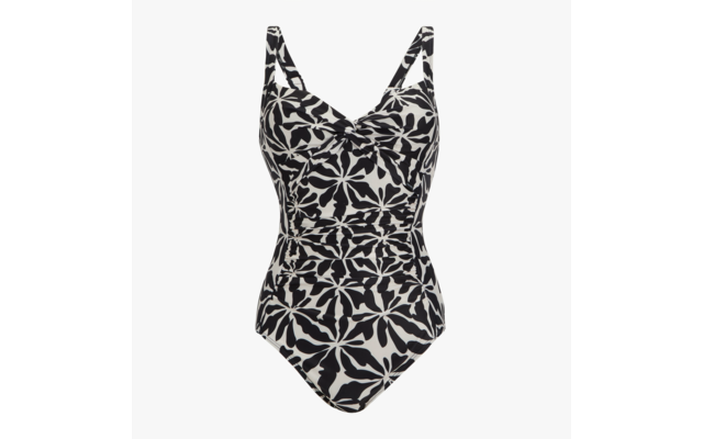 Maillot de bain une-pièce noir et blanc à motif floral, torsade sur le devant, larges bretelles, vue de face sur fond blanc