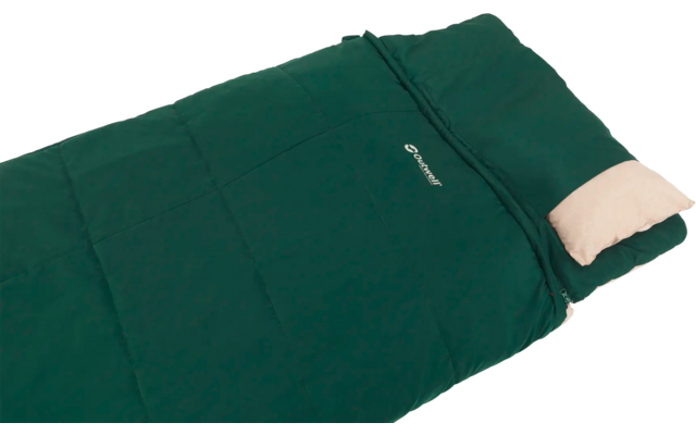 Groene slaapzak met beige kussen