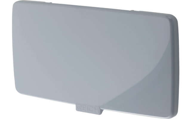 Couvercle rectangulaire en plastique gris clair, angles arrondis, petite languette en bas avec inscription en relief REICH