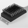 Brosse rectangulaire avec poils métalliques denses sur un socle en plastique noir ; pièce métallique plate fixée avec deux trous ronds et un bord entaillé