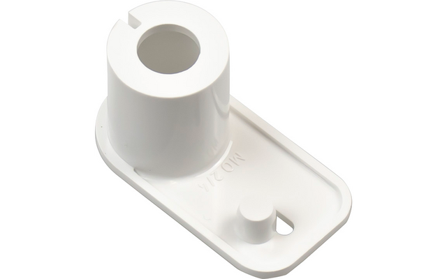 Objet en plastique blanc avec une douille cylindrique percée au centre, base rectangulaire aux coins arrondis, petit ergot rond, fente allongée et marquages en relief