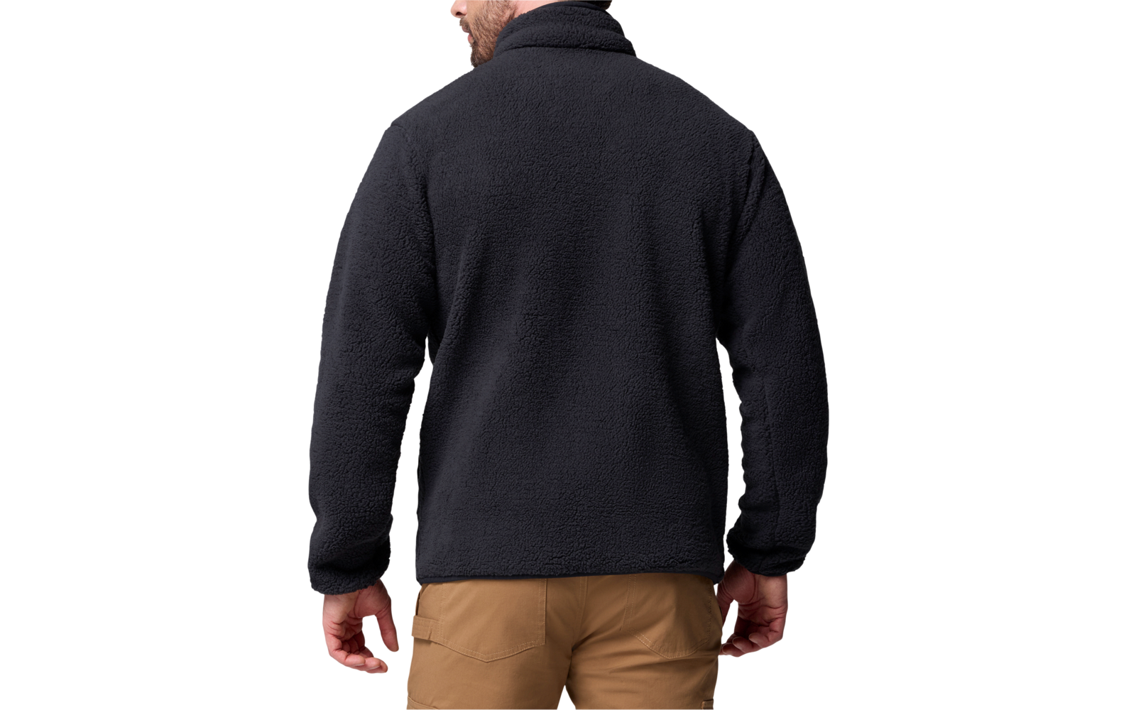 Person von hinten mit schwarzer Jacke und brauner Hose