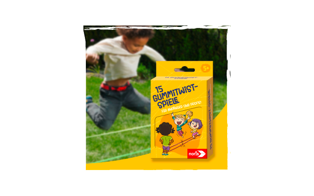 Un enfant joue dehors, au premier plan une boîte jaune avec l'inscription Gummitwist-Spiele