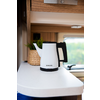 Electric kettle on a white countertop in a kitchen setting