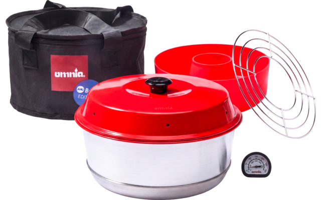 Contenitore metallico rotondo argentato, coperchio rosso, ciotola rossa in plastica/silicone, griglia metallica, piccolo termometro rotondo, borsa da trasporto nera con scritta bianca 'omnia'