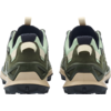 Pair of green sneakers, rear view side by side, light green and dark green materials, beige midsole, black lugged outsole, heel pull tabs, dark inner lining