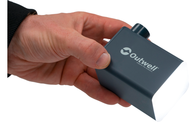 Hand holding a gray rectangular light with "Outwell" logo; front light panel white