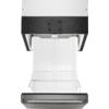 Koffiemachine met glazen container op een grijs oppervlak