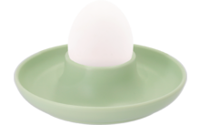 Wit ei in een groene eierdop