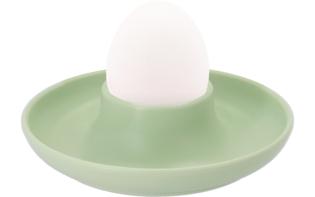 Weißes Ei in einem grünen Eierbecher