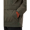 Nahaufnahme einer Hand in der Tasche einer grünen Jacke