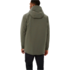 Person von hinten mit grüner Kapuzenjacke und schwarzer Hose