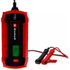 Rood rechthoekig apparaat met zwarte voorkant, groen display met "13.6V", aangesloten rood en zwart krokodillenklemmen en kabel, opschrift "Einhell"
