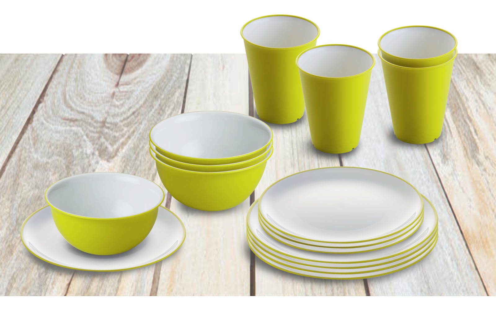 Verschillende geel-witte borden, kommen, kopjes en schotels op een houten oppervlak