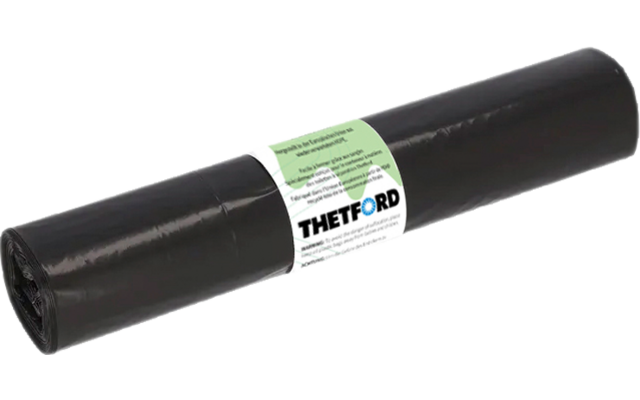 Eine schwarze Abfalltüte zusammengerollt mit einem weißen Etikett in der Mitte