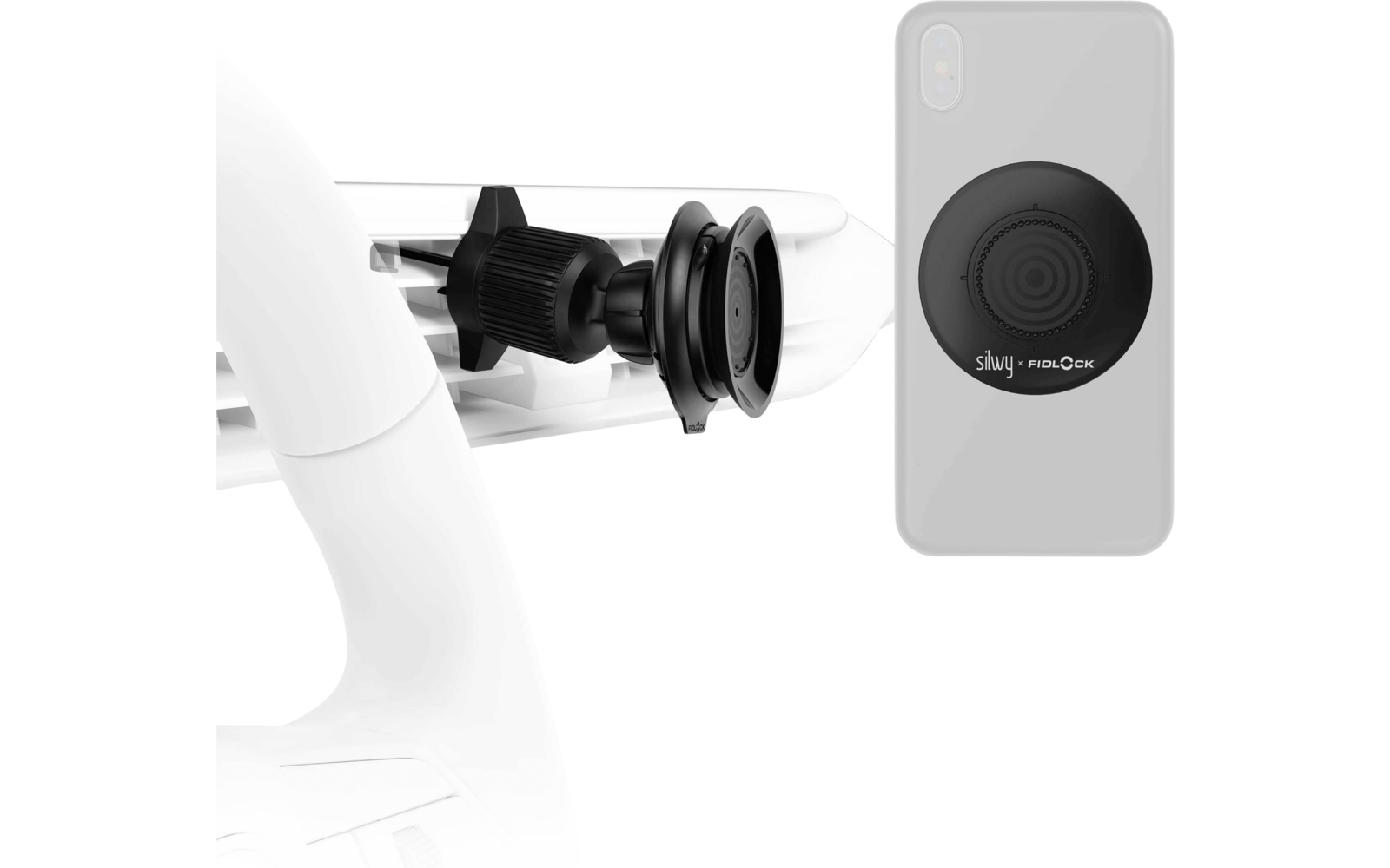 Black round adapter on the back of a smartphone next to a black vent clip with a mounting pin