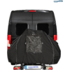 Heckansicht eines schwarzen Vans mit einer schwarzen Abdeckung auf dem Heck-Fahrradträger, mit rechteckigem durchsichtigem Fenster und Kennzeichen "HINDERMANN"